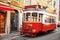 Lisbon, Portugal. Vintage red retro tram