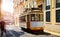 Lisbon Portugal. Yellow vintage tram driving