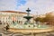 LISBON, PORTUGAL â€“ December12, 2018: Spectacular baroque fountain and statue of Dom Pedro IV in Praca Dom Pedro IV or Rossio