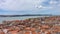 Lisbon roofs timelapse with Tagus river and suspension bridge
