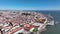 Lisbon Skyline. Downtown and Old Town in Background. Portugal. 4k. Drone Point of View