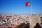 Lisbon spring skyline with Portugal flag