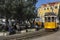 Lisbon street with traditional yellow trams