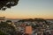 Lisbon viewpoint sunset over rooftops