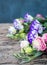 Lisianthus bouquet on a wooden table