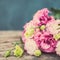 Lisianthus bouquet on a wooden table