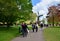 Lisse, The Netherlands - May 7, 2015: Old windmill with many tourists in famous garden in Keukenhof.