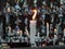 Lit candle in front of blured photos and other candles in Cerro San Cristobal, Santiago, Chile