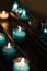 Lit Religious Votive Candles