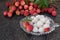 Litchi fruits. Fresh juicy lychee fruit on a glass plate. Peeled lychee fruit.