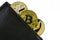 Litecoin, bitcoin and ethereum lie in black leather wallet closeup