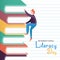 Literacy Day concept of kid climbing book mountain