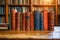 Literary legacy Old books arranged on a wooden table backdrop