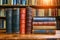 Literary legacy Old books arranged on a wooden table backdrop