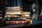 Literary piles on a table, set against a librarys soft focus