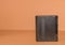 Lithium-ion battery on brown background