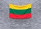 Lithuania flag hanging on brick wall