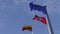 Lithuanian and EU European Union flags against blue sky close up