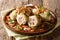 Lithuanian food: Cepelinai boiled potato dumplings with minced m