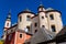 Litomysl, Czech Republic, 17 April 2022: Church of the Finding of the Holy Cross and Piarist dormitory near castle, baroque