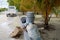 Litter and overflowing garbage cans along the side of the road on the Maldivian