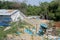 Littering of garbage in front of private houses along colombian coast, Santa Marta, Columbia