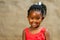 Little african girl with braided hairstyle.