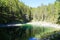 little alpine lake near lake Eibsee by foot of mountain Zugspitze in Bavaria (Garmisch-Partenkirchen, Germany)