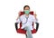 Little Asian girl child in white doctor gown and protective mask showing stethoscope and index finger sitting on red chair