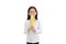 Little asian girl holding sweet corn standing on white background. Kid and vegetable concept