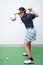 Little asian girl takine golf club training