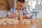 little asian kid boy child children schoolboy playing wood block