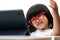 Little Asian Preschooler girl wearing red glasses and using tablet pc on white background, Asian girl talking and learning with a
