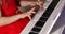 Little Baby Girl or Child Professional Pianist Plays Classical Music on a Beautiful White Piano a Christmas Holiday