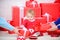 Little baby girl play near pile of gift boxes. Gifts for child first christmas. Celebrate first christmas. Sharing joy