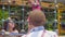 Little baby girl walking on a rope playground