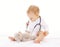 Little baby playing and listens stethoscope