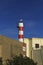 Little beach lighthouse in Ferragudo town, Portugal