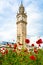 Little Big Ben in Belfast, Albert Memorial Clock Tower on sunny day with blue sky.