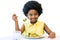 Little black girl eating healthy vegetable meal.