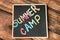 Little blackboard with text SUMMER CAMP