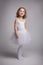 Little blond girl in a ballet dress