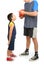 Little boy asking big man to play basketball