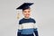 Little boy in bachelor hat or mortarboard