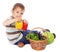 Little boy with basket of vegetables