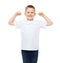 Little boy in blank white t-shirt showing muscles