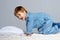 Little boy in blue pyjamas