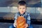 Little boy with bread on the street