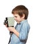 Little boy cameraman filming with retro camera