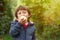 Little boy child kid eating apple fruit autumn fall copyspace ga